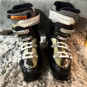 Salomon Black and White Ski Boots with Silver Accents